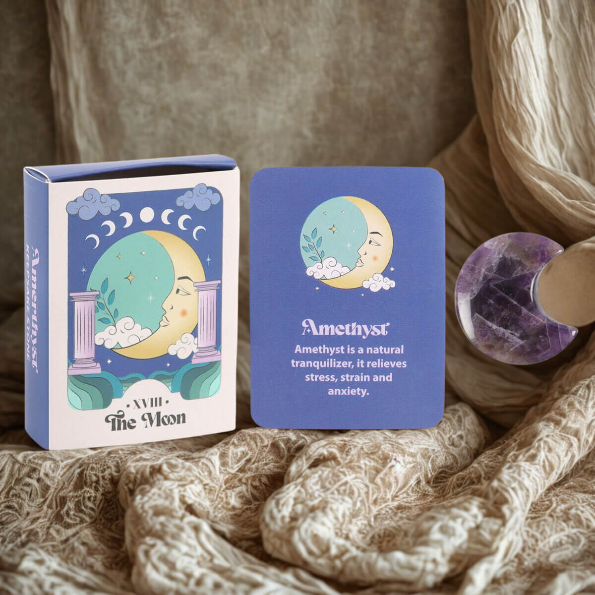 Amethyst card with packaging and crystal on a textured surface